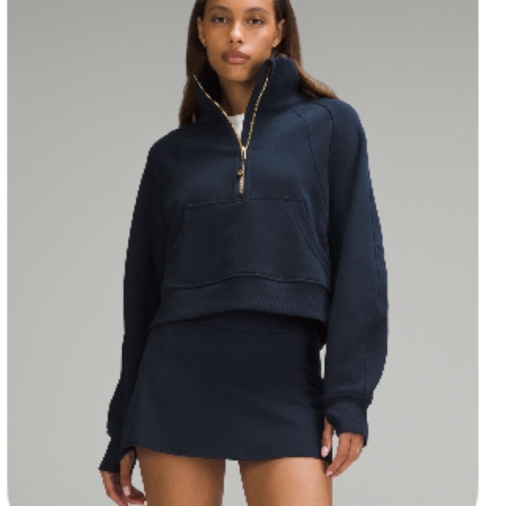 Lululemon Navy and Gold Scuba Funnel Neck.